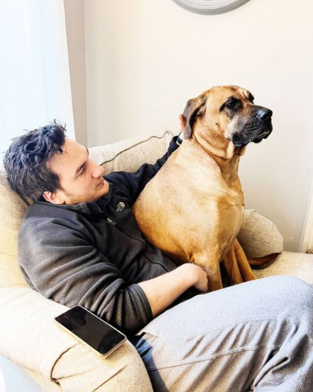 Charlie Cavill with his dog.